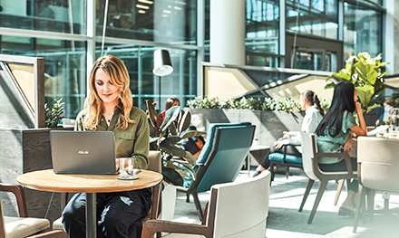 A woman working remotely on her laptop PC.