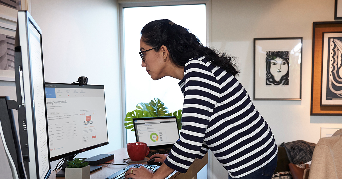A woman working at her desk.