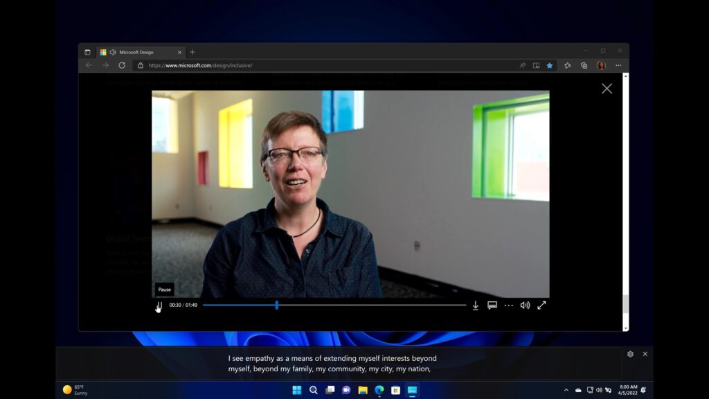 A PC screen shows Live Captions, a new feature that empowers people to easily access captions from audio experiences.